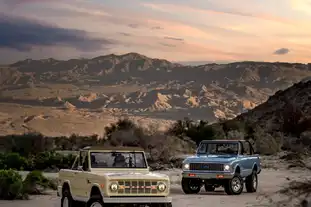Rugged Adventures_Yellow Classic Ford Bronco And Blue Chevy K5 Blazer