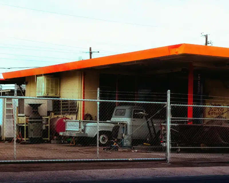 classic truck behind a fence