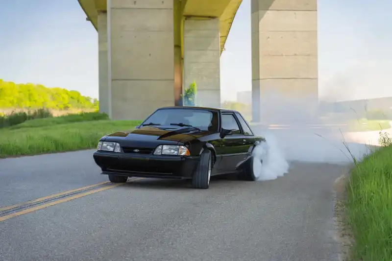 80028 Black Foxbody_1323_Lifestyle_Under Bridge