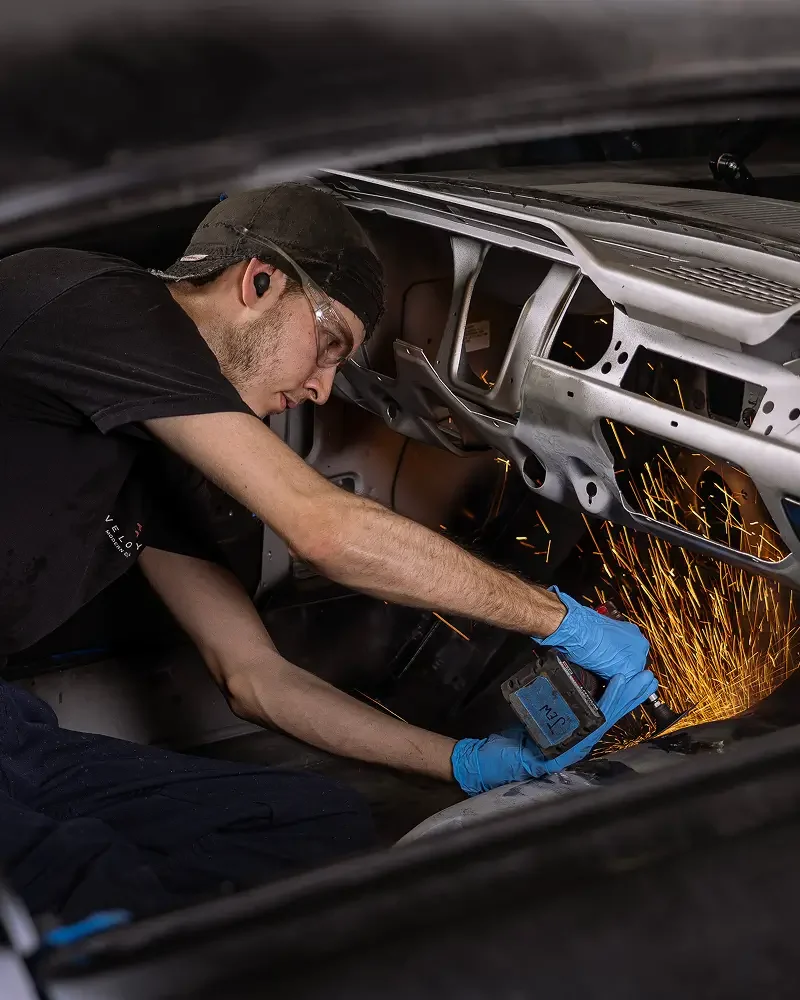 Velocity technician preparing restomod bodywork