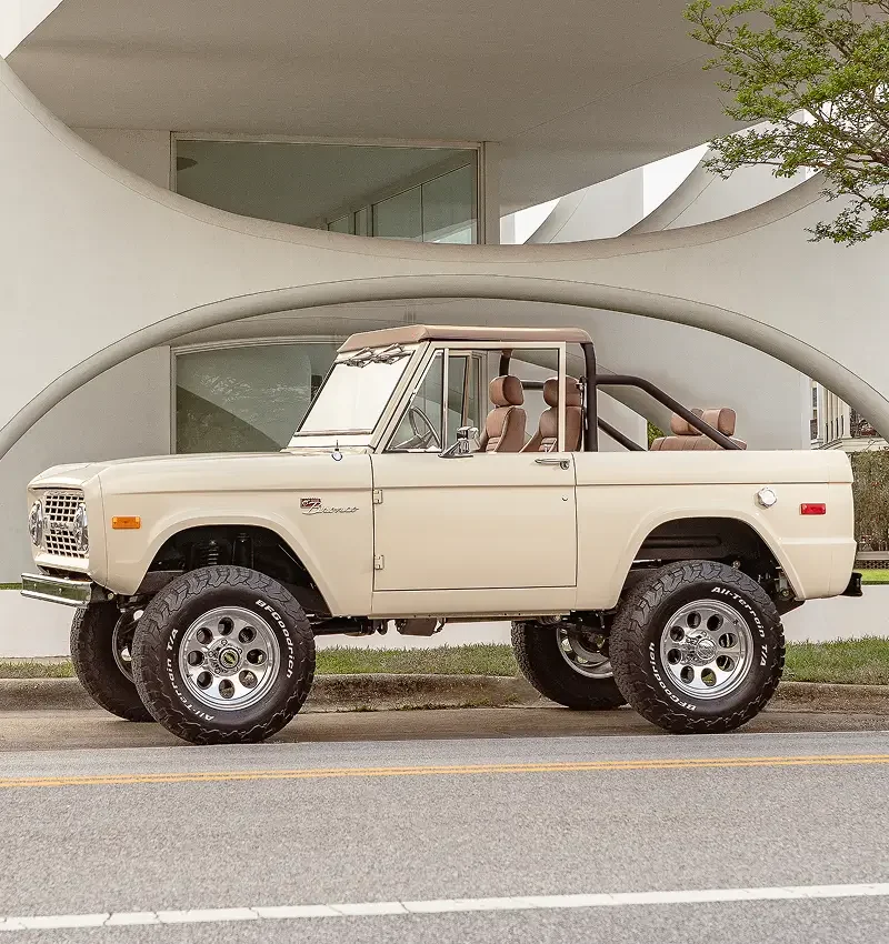 Velocity restored Ford Bronco in an urban environment