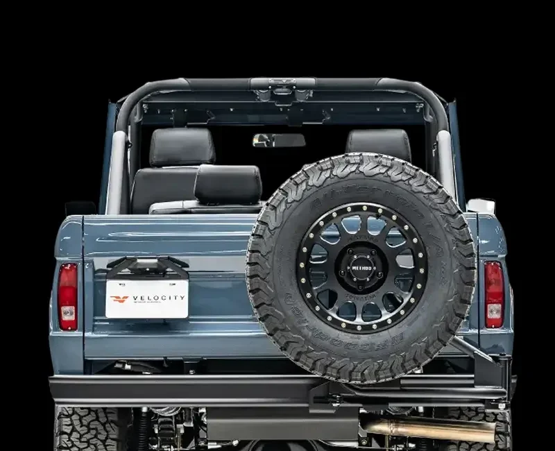 Bronco spare tire bracket with matching rim and tire