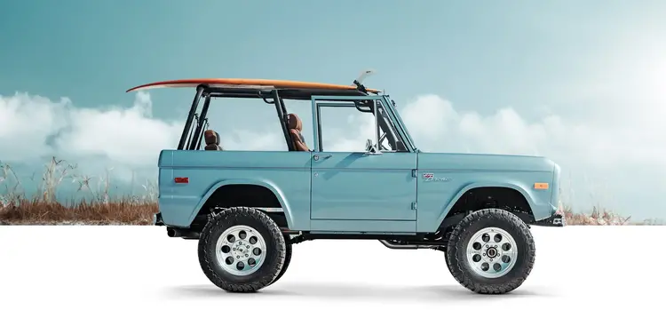 Signature Series Classic Ford Bronco with surfboard on roof