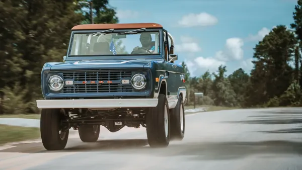 Restored classic Ford Bronco on the road