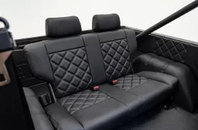 https://www.velocityrestorations.com/assets/vehicles/1196-1976midnight-red0018custom-rear-seats-sm.webp