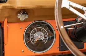 https://www.velocityrestorations.com/assets/vehicles/1505-1973pearl-orangebronco0028digital-instrument-sm.webp