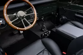 https://www.velocityrestorations.com/assets/vehicles/1727-1970-velocity-classic-ford-bronco-14-15-driver-side-interior-sm.webp