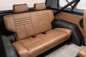 https://www.velocityrestorations.com/assets/vehicles/1757-velocity-1975-blue-ford-bronco16-rear-onterior-sm.webp