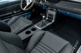 https://www.velocityrestorations.com/assets/vehicles/3788-1968-brittany-blue-ford-mustang16-rear-onterior-sm.webp