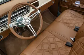 https://www.velocityrestorations.com/assets/vehicles/4199-velocity-1971-ford-f100-14-15-driver-side-interior-sm.webp