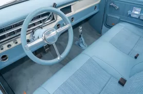 https://www.velocityrestorations.com/assets/vehicles/440-1970-wind-blue-ford-f250driver-side-interior-sm.webp